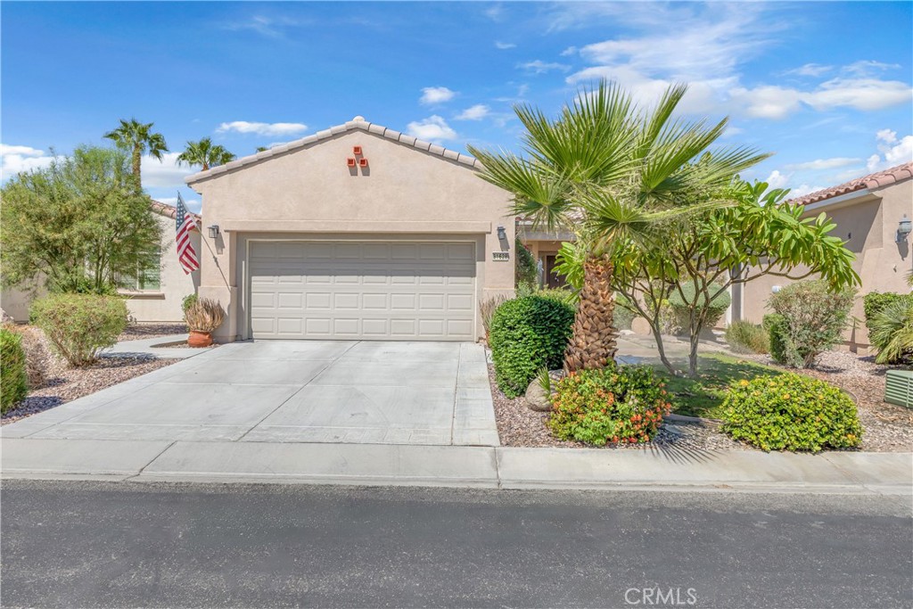 The lifestyle you’ve been waiting for. Welcome to this charming home on Avenida Parito, a beautifully maintained 2-bedroom, 2-bath home in the heart of Sun City Shadow Hills, one of the Coachella Valley’s premier 55+ communities. This south-facing home features tile flooring throughout, granite countertops, and a brand new A/C system for year-round comfort. The efficient layout flows seamlessly from the kitchen into the living areas, with plenty of natural light throughout. Out back, a lushly landscaped yard offers privacy and tranquility. The covered patio is the perfect place for relaxing, entertaining, or enjoying the desert sunsets. Residents of Sun City Shadow Hills enjoy access to two golf courses, clubhouses, resort-style pools, fitness centers, pickleball and tennis courts, and 24/7 gated security, just minutes from shopping, dining, and freeway access. Whether you're looking for a full-time residence or a seasonal retreat, this home delivers comfort, convenience, and community in one of the desert’s most sought-after neighborhoods.