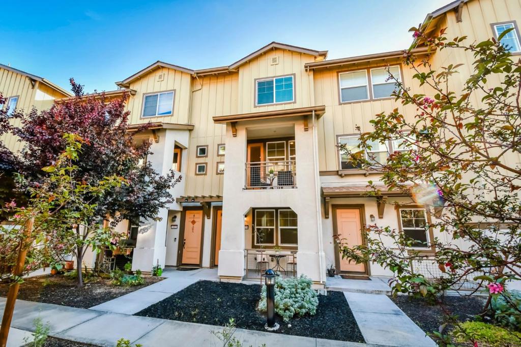 Live the high life in this 3-story townhome with an open floor plan, high ceilings, a balcony, and extremely convenient commute! Renovated with Natural Walnut hardwood floors and dimmable recessed lighting throughout. Kitchen has a sparkling granite peninsula and is fully equipped with SS appliances including Kitchenaid French door fridge/freezer w/ water+ice dispenser, Whirlpool Gold series oven+gas stove and Whirlpool dishwasher. Extra storage on every floor, including under the stairs and a walk-in kitchen closet. Tiled bathrooms shine with Piedrafina marble countertops and shower surrounds. Owners suite has 1 normal closet and 1 walk-in closet. Owners bath has a dual sink and vanity. 2-zoned Central heating and cooling controlled by Honeywell thermostat. Side-by-side garage sets it apart from other townhomes in the same community. Dual pane windows protect from road noise. Whirlpool washer+dryer. Community recreational assets include a playground, clubhouse, and picnic areas.