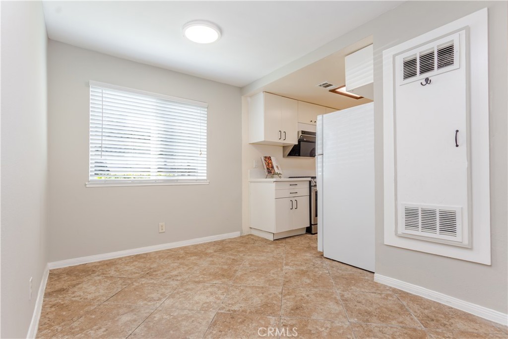 Desirable Downstairs Corner Unit in a gated community. Well-maintained 2-bedroom, 1-bathroom downstairs corner unit featuring a spacious floor plan and large private patio. The updated kitchen is appointed with quartz countertops and a gas range. The bathroom offers a generous layout with tub.
Additional upgrades include upgraded windows and sliding door, central A/C, and fresh finishes throughout. This home also offers two assigned parking spaces for convenience. The community features low HOA dues and an association pool, perfect for enjoying those hot summer days. Conveniently located near shopping, dining, and freeway access. Do not miss out on this great condo at a great price.