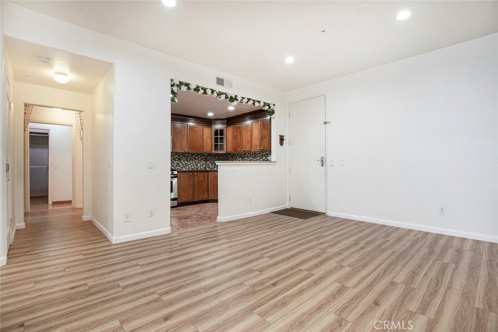 This thoughtfully designed 2-bedroom, 2-bathroom condominium offers a warm and practical living space that’s easy to settle into.
The master bedroom includes a private en-suite bathroom and a spacious closet, providing both comfort and convenience.
The open living and dining area features a cozy fireplace—perfect for relaxing evenings or casual gatherings.
In the kitchen, granite countertops, wood cabinets, and durable laminate flooring combine function with style.
There is washer dryer hook up inside the unit.
The building is equipped with an elevator for easy access, and the unit includes two assigned parking spots.
Residents can also enjoy a secure and well-maintained rooftop pool—ideal for quiet downtime or hosting friends in a relaxed setting.