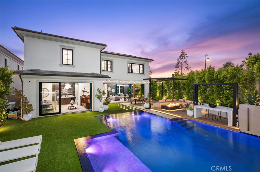 Retreat to the Ultimate Luxury Guard-Gated Destination--Altair, Irvine. Our Prestige “Solano” Collection Artemis Chateau home built by Toll Brothers exceeds every expectation and is situated on a Premier CORNER Lot Location with an oversized 8,659 lot size & captivating hillside views! The showstopping residence with undeniable wow factor IS AVAILABLE FURNISHED OR UNFURNISHED & features 5BD (including One Main Level BD) 5.5BA (Including 1.5 Main Level) plus a Main Level Office, 2nd Floor Bonus Room, Master Bedroom Retreat, a Prep Kitchen, Private Courtyard, an Entertainer’s Backyard Designed to Impress, and 5,181 Sq. Ft. of decadent indulgence! With Uncommon Experiences at every turn, the home offers the Finest Indoor Elements including Floating Staircase, Luxury Engineered Hardwood Flooring, Custom Wallpaper Accent Walls, Wainscoted Walls, Solar Panels, Linear Great Room Fireplace, Custom Fitted Drapery & Window Shades, &Completely Customized Grandiose Outdoor Retreat with Shaded Trellis, Pool & Spa with Waterfall Features & LED Lighting, Artificial Turf, Built-In Barbecue with Pendant Lighting & Beverage Fridge, Outdoor Fireplace, Custom Wood Decking, Outdoor String Lighting, & Mature Landscaping designed for Ultimate Privacy! Chef-Inspired Gourmet Kitchen with Spacious Kitchen Island, Quartz Countertops, Decorative Backsplash, Shaker Cabinetry with Hardwood Soft-Close Drawers, Built-In Refrigerator, Wine Fridge, and ALL Stainless Steel Appliances! World-Class Amenities exclusive to Altair residents—24 Hour Staffed Gated Entrance, Junior Olympic Pool, Sport Court, Tennis Court, Clubroom, and Hiking/Biking Trails! Award-winning Irvine Unified School District (zoned Solis K-8 & Portola High) and minutes from Irvine Spectrum Center, Woodbury Shopping Center, Five Point Amphitheater, & Toll Roads!