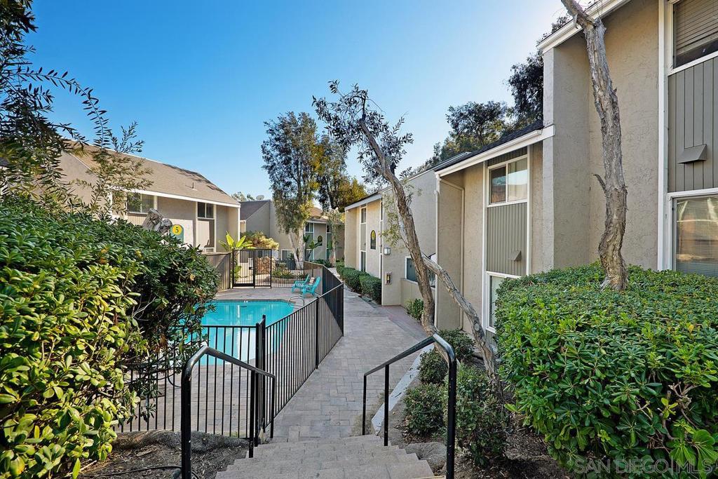 Beautiful move in ready condo in the centrally located Lake Park Villas. The living room is spacious and has brand new vinyl plank waterproof flooring. Nice kitchen features maple wood color cabinetry & granite countertops. Both bedrooms are upstairs and are spacious with full ceiling height mirrored closet doors. Dual pane windows. Fresh paint throughout the unit. Easy access laundry within same bldg next to the home. Private and gated patio is perfect for relax and entertaining guests. close to SAN DIEGO STATE, shops, freeways & restaurants. Complex features: gated community, two swimming pools, grass areas and beautiful landscaping. Equipment: Range/Oven Sewer: Sewer Connected