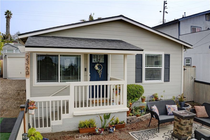 Fall in love with this darling coastal retreat just minutes from the sand! This beautifully updated 2-bedroom, 1-bath home offers peek-a-boo ocean views and the perfect blend of comfort and style. Step inside to find a spacious open kitchen featuring granite countertops, stainless steel appliances, tile flooring, and bar seating for up to six—ideal for casual dining or entertaining friends.
Enjoy the freshly updated interiors, including newer carpet and a light, airy feel throughout. Outside, the low-maintenance backyard provides the perfect spot to relax after a day at the beach, while RV hookups in the drivewaymake it easy to host guests or take off on your next adventure.
This home truly shows pride of ownership, with recent improvements to the front porch, laundry room, new roof and both front and back yards. Everything has been done for you—just move right in and start enjoying the Morro Bay lifestyle!