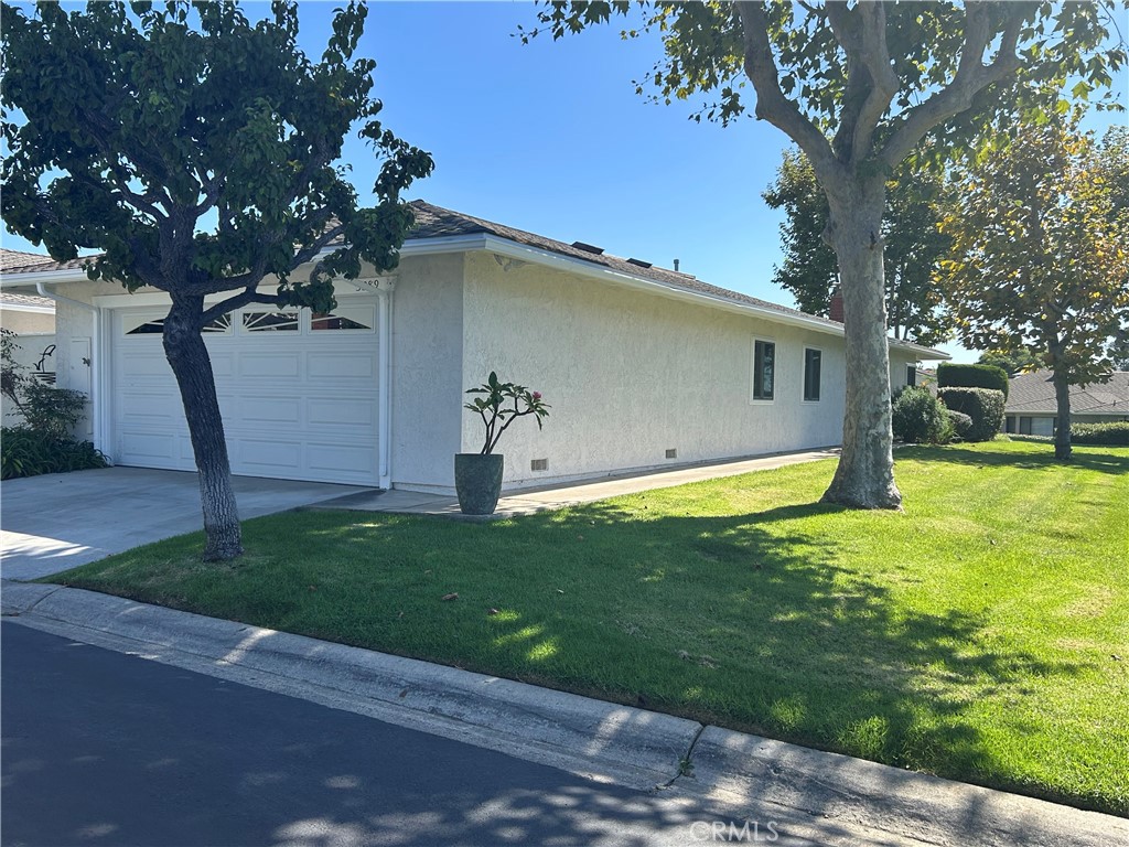 Welcome to this charming single level home in Seascape Village, ideally located on the desired ocean side of the 5 freeway in North San Clemente. This three bedroom, 2 bathroom home spans 1,526 square feet of living space and with attached two car garage. Step through the front entry into a large, light filled living room with a cozy fireplace. The kitchen over looks the dining area, which opens to a patio through a sliding door. Conveniently positioned between Dana Point Harbor and downtown San Clemente, this location offers easy access to the best of both seaside towns. Seascape Village offers various amenities to the residents, such as three community pools, tennis/pickleball courts, Jacuzzi and clubhouse. So much more is offered and this is a "MUST SEE" property. Within walking distance, you'll find Sprouts, Nordstrom Rack, Home Goods, TJ Maxx, See's Candies and more. Don't miss this opportunity to own your BEACH RETREAT!with gate to the greenbelt. Come view for yourselves and make your home by the beach!