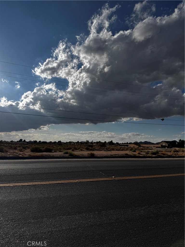 Beautiful parcel of land in a highly sought out area of Apple Valley . Right off Central Rd sits this roomy 19.56 Acre parcel of land . Come look at it for yourself and see what opportunities it holds