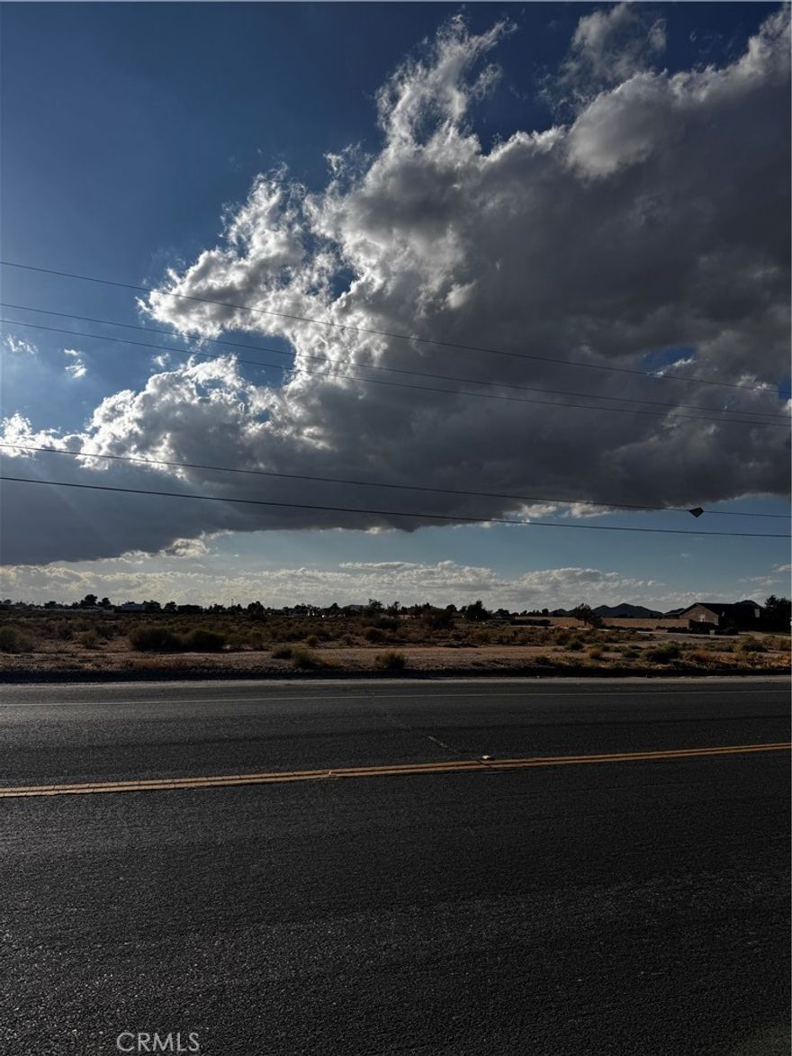 Beautiful parcel of land in a highly sought out area of Apple Valley . Right off Central Rd sits this roomy 19.56 Acre parcel of land . Come look at it for yourself and see what opportunities it holds