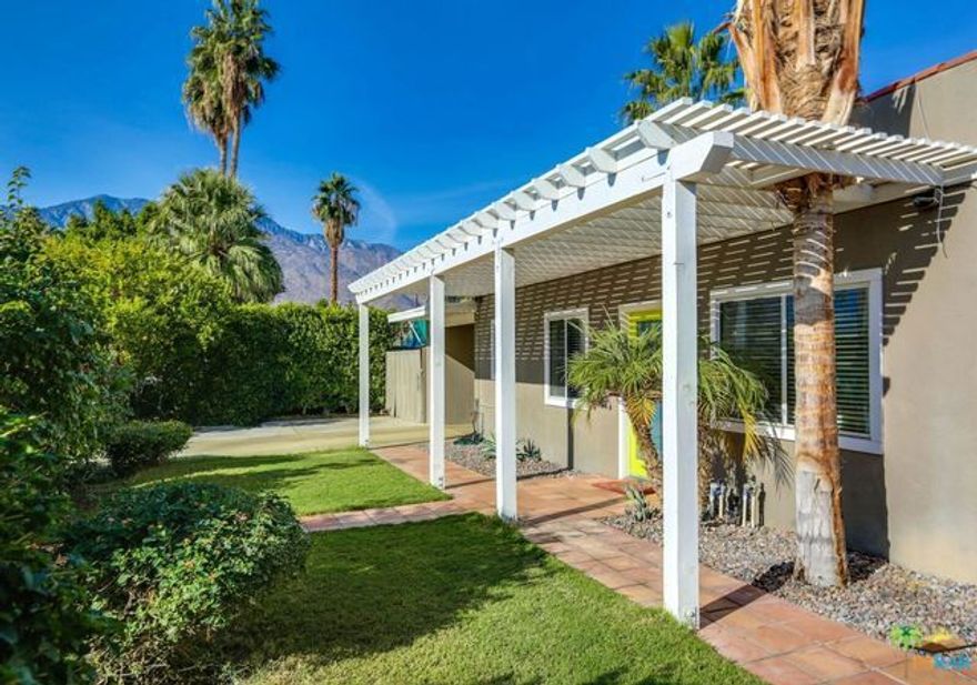 Here is the perfect Palm Springs starter pad! Welcome to Sunny Dunes located in the trending neighborhood of Demuth Park. This beautiful home holds the key to your slice of paradise. Private and cozy just the way you like it! Property is perfectly gated offering tons of private parking space for multiple cars or a small airstream. The grounds have mature hedging all the way around. Views connect you to the mountains from the front yard to the farside of the pool. Property is perfect for the dog lover looking for worry free enclosure. Inside this 2 bedroom 1 bath home you will find yourself amazed at how spacious things feel. Both bedrooms have large french doors creating the indoor outdoor living that is Palm Springs. Bathroom has been nicely updated and new lament flooring throughout home. You will also find new stainless fridge and dishwasher, new motor for pool heater, new swamp cooler, new ceiling fans, zero scaped exterior outside of gate, and new keyless gate entry. Must see!