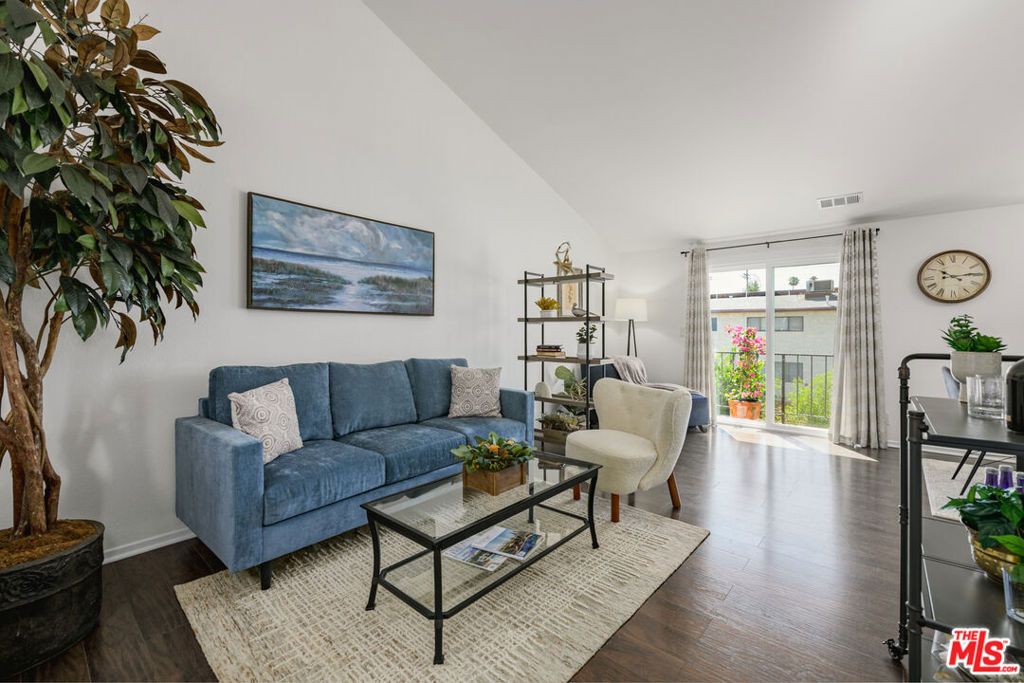 Photo of 7439 Woodman Avenue #25, Van Nuys, CA 91405 (MLS # 26665287)