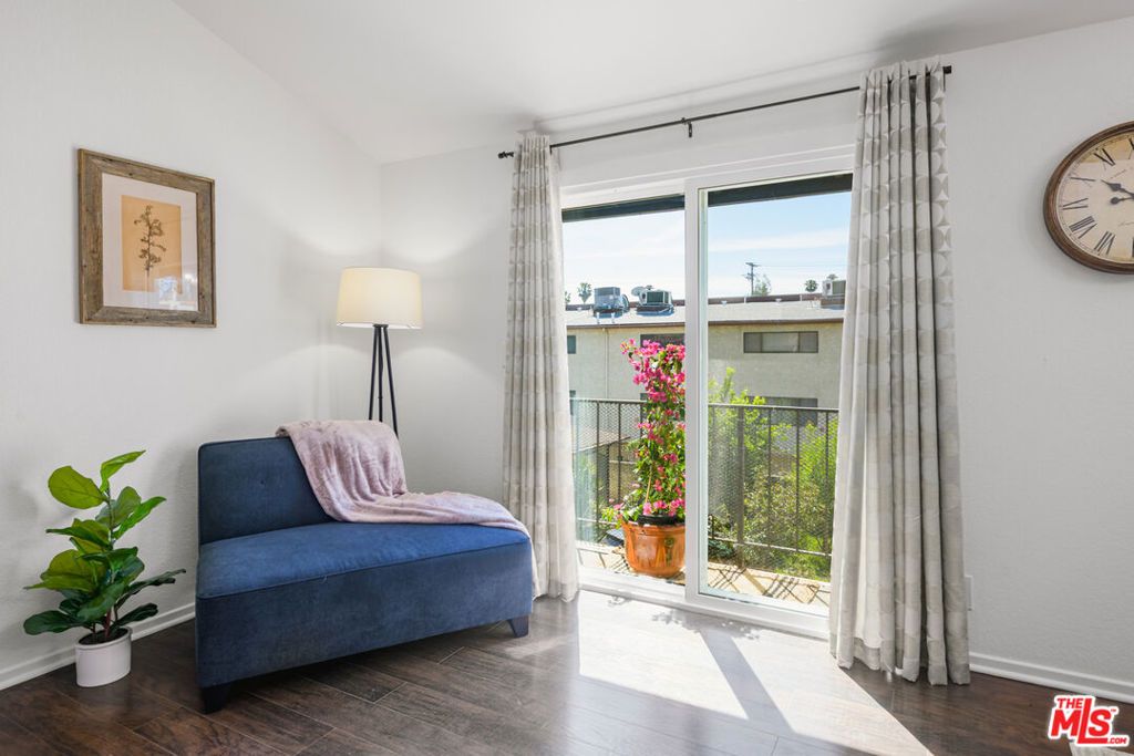 Photo of 7439 Woodman Avenue #25, Van Nuys, CA 91405 (MLS # 26665287)