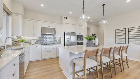Photo of 401 Mulligan, Irvine, CA 92618 (MLS # OC25235235)