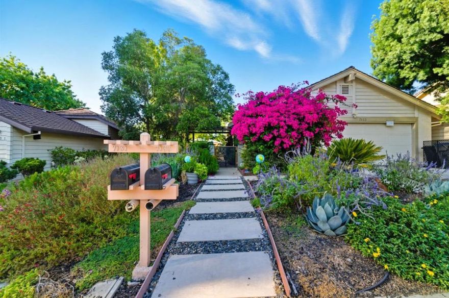 Elegant Garden Retreat with Modern Finishes. Tucked away on a quiet cul-de-sac, this beautifully updated home offers rare privacy with no front or rear neighbors and tranquil hill views. Surrounded by mature trees and drought-tolerant landscape. It combined natural serenity with modern living. Inside, enjoy uniform wood floors, a chef's kitchen with leathered marble island, Taj Mahal quartzite countertops, Italian glass backsplash, and high-end stainless steel appliances. The open living and dining areas feature a modern electric fireplace and sliding doors to an a covered patio, ideal for year- round entertainment. the primary suite includes a spa like bathroom with linear-drain shower, built-in seat, and quite Bluetooth fan system. Smart home feature include a digital door lock, Nest thermostat, and smart landscape lighting. A new furnace (2023) and oversized two car garage with golf cart space complete this stylish and tranquil retreat.