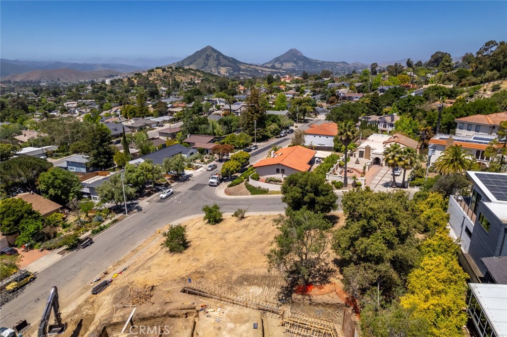 Prime Banana Belt Lot with Views; Plans Included! Discover a rare opportunity to build your dream home in San Luis Obispo's coveted Banana Belt neighborhood. This expansive 11,210 sq ft lot sits on a quiet cul-de-sac surrounded by established homes. The lot offers an elevated setting with breathtaking views spanning from Edna Valley to Bishop's Peak. Enjoy the perfect balance of peaceful seclusion and convenience, with downtown SLO just minutes away—offering easy access to shops, restaurants, and entertainment. Renowned for its mild climate and natural beauty, this location is ideal for creating a private retreat in one of the area’s most desirable neighborhoods. As an added bonus, the listing includes thoughtfully designed home plans by AGD Architecture & Design, easing the path to your future residence. Don't miss this exceptional chance to build in one of San Luis Obispo’s most sought-after settings.