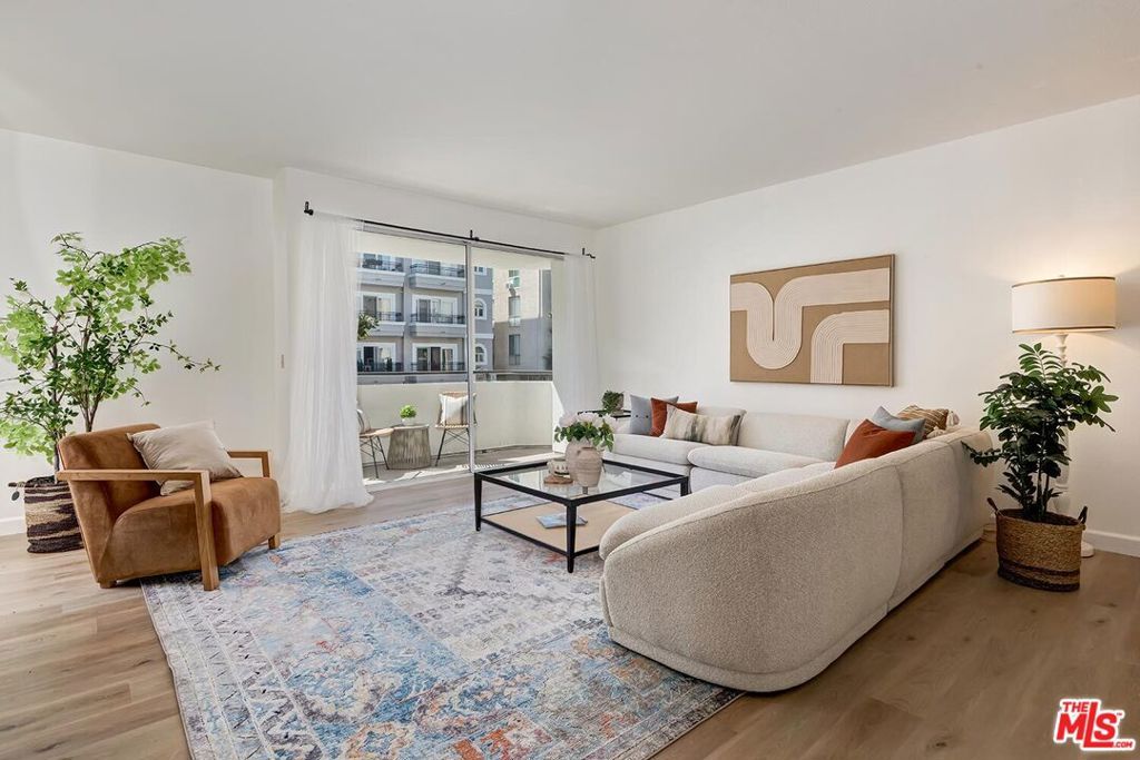 Photo of 1164 Wellesley Avenue #103, Los Angeles, CA 90049 (MLS # 25600105)