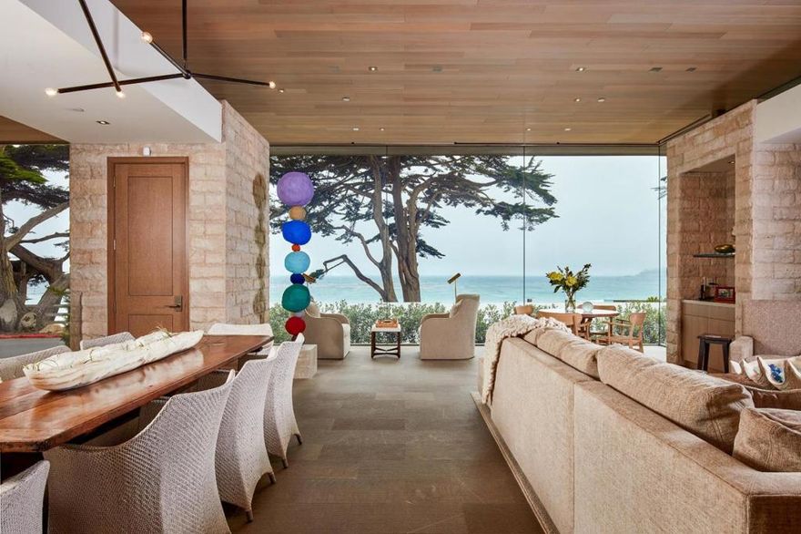 California Modern design blends effortlessly with expansive ocean views in this iconic Carmel-by-the-Sea property. Thoughtfully designed with 4 beds and 4.5 baths on over 3,150 sqft, this home is ideal for entertaining guests while watching the sun set over the white sands of Carmel Beach. On the main level, there is a large primary suite with walk-in closet and private deck with a hot tub, an expansive living room with vaulted ceilings that's open to the kitchen, and a private guest suite that looks over the outdoor fire pit to the beach. Downstairs, guests have ultimate privacy with two guest suites, a laundry room, wine storage area, 2 car garage, private steps up to the beach and expansive storage. Located in the heart of the Golden Rectangle, a short stroll from the restaurants and art galleries in downtown Carmel, this home is perfect for a weekend getaway or for hosting friends in town playing golf in Pebble Beach. SeaGlass is on the forefront of modern design and a true landmark on Scenic. This stunning contemporary awaits the most discerning buyer.