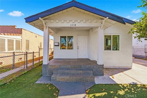 Photo of 1118 E 77th Pl, Los Angeles, CA 90001 (MLS # DW26066982)