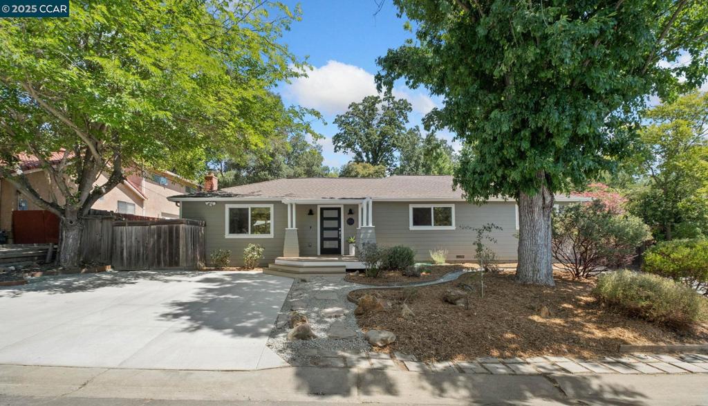 Open Saturday & Sunday 2-4pm! Nestled in the heart of the highly sought-after Parkmead neighborhood, this beautifully updated 3-bedroom, 2-bathroom single-level home sits on a generous 10,105 sq ft lot—nearly a quarter acre of prime Walnut Creek living! Enjoy a short stroll to top-rated schools, vibrant downtown shops, acclaimed restaurants, and more—all while enjoying the peace and quiet of this tucked-away location. Inside, the thoughtfully upgraded kitchen features custom cabinetry, sleek GE Café appliances, stunning quartz countertops, and a stylish stainless steel countertop prep area, all flowing seamlessly into the open-concept family and dining areas—perfect for entertaining or cozy nights in. The gorgeous remodeled bathrooms are filled with natural light thanks to skylights and elegant finishes, offering a serene, spa-like feel. Step outside to beautiful drought-tolerant landscaping in both front and back yards, a spacious patio ideal for outdoor dining, and two storage sheds for added convenience. A standout feature is the newer detached garage—a versatile space perfect as an artist studio, home gym, or even a potential ADU conversion (buyer to verify). Don’t miss this rare opportunity to own a turnkey home in one of Walnut Creek’s most beloved neighborhoods!