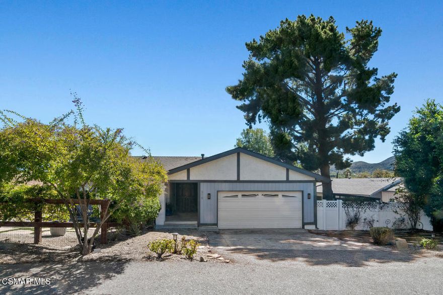 Tucked at the end of a cul-de-sac in Thousand Oaks, this beautifully remodeled 3-bedroom, 2-bath home blends modern comfort with timeless style. Set on a large, low-maintenance lot, it features owned solar with a Tesla battery for energy efficiency and peace of mind. The inviting kitchen showcases custom cabinetry, sleek stone countertops, stainless steel appliances, and a convenient breakfast bar that opens to the living area--perfect for entertaining. Warm hardwood flooring flows throughout, complemented by brand new ceiling fans, wall sconces, and light fixtures. The spacious living room offers a cozy fireplace and access to a balcony that extends the living space outdoors. The primary suite includes its own balcony retreat, a walk-in closet, and a stunning remodeled bath. Both bathrooms feature elegant tile showers, with the hall bath offering a tub/shower combo. Outside, the expansive yard is designed for relaxation and fun, complete with an above-ground swim spa and ample room to play, garden, or gather with friends. A rare find that combines style, efficiency, and privacy in a prime Thousand Oaks location.