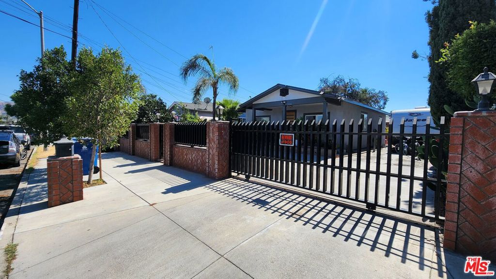 New Co-Ownership Opportunity: This recently updated property offers incredible versatility and value. The main home features 3 spacious bedrooms and 2 bathrooms with a beautifully remodeled kitchen, brand-new flooring, and fresh paint inside and out. But that's not all this property also includes a 1-bedroom, 1-bathroom guest house, perfect for extended family, rental income, or a private home office. With RV access and ample parking, there's room for all your vehicles and more! Conveniently located near the 5 Freeway and just 2 minutes from Burbank Airport, the property provides easy access to schools, including Glenwood Elementary and Sun Valley High School, as well as popular shopping centers such as the Burbank Empire Center and Sun Valley Plaza. This is a wonderful opportunity for a big family or two families looking to share a home while enjoying their own space. Don't miss out on this rare find in a prime location!