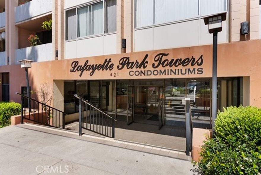 Great Condo, Great Price!!  This condo is conveniently located less than two miles from Downtown LA, Staples Center, Metro Train, and much more.  Walking distance from McArthur Park, shops, restaurants, and grocery.  The unit has one bedroom and one bath, separate dining area, den with fireplace and an extra large balcony area that lets out to a garden area.  There is a secured entrance with lobby.  One parking space is included in the gated garage area.  Rooftop pool with great views of downtown LA.  This unit is great from couples or a single person.