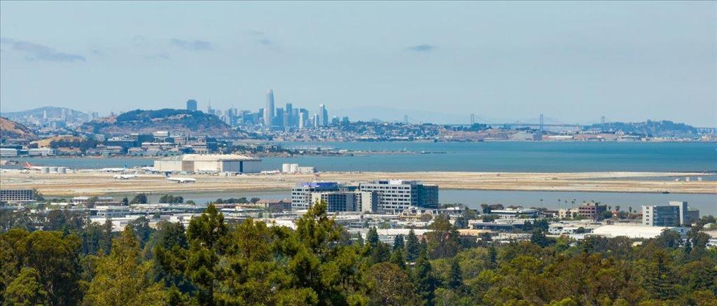 Discover a masterpiece of luxury living in Hillsborough's most prestigious neighborhood, boasting breathtaking San Francisco Bay Area views. Set on over 1 acre, this exquisite home features an open floor plan, a chef's kitchen, and a luxurious primary suite, offering an unparalleled living experience. Step outside to your private pool and gazebo, where you can soak in the captivating vistas that define the essence of Bay Area living. Note: County records show 4 Bedrooms, 5585 SF. 5861 Sf is based on floor plan measurements provided by Bhupesh Patel. Sellers plans show 5th bedroom. Buyer to investigate to satisfy themselves.