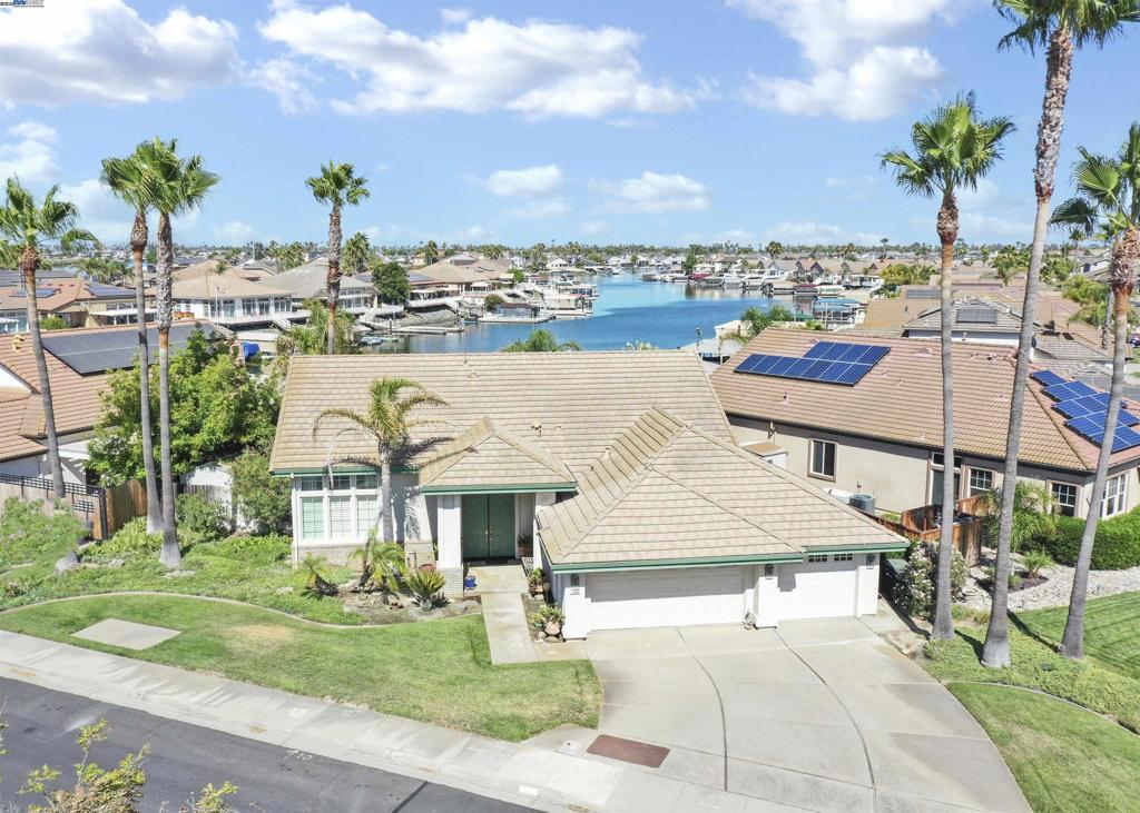 OPEN HOUSE SUNDAY 7/13 2:15 - 4:00 - WATERFRONT SINGLE STORY WITH FABULOUS WATER VIEWS! DESIRABLE FLOOR PLAN - 2099 SQ FT W/3 BEDROOMS & 2 FULL BATHS -3 CAR GARAGE - ENTERTAINER'S BACK DECK W/LARGE BOAT SLIP - Open floor plan w/high ceilings - Formal Living & Dining area - Spacious family room w/fireplace opens to kitchen - Chef's kitchen offers granite counters, abundance of cabinets, Center-Island, double ovens, gas stove, eat at bar + casual dining area all with water views - Primary w/double entry door, spa like bath with jetted tub, separate shower, dual vanity's, walk-in closet & slider door to back deck - Huge back deck (Entertainer's Delight), landscaped side yards with storage shed, Private boat dock with large side mount boat hoist - All this and more...