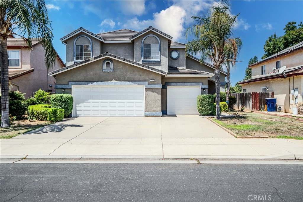 Extraordinary opportunity to own this fine home, pull up and take in the welcoming curb appeal, walk into the spacious formal living room with high vaulted ceilings, neutral color laminate flooring and attractive window treatments, walk over to the adjacent spacious formal dining room with attractive hanging light fixture as you glance through the picturesque window view, step into the spacious and fantastically designed kitchen with attractive granite counter tops, garden window sits over the stainless steel sink, dishwasher, range, microwave, oven and fridge all matching in color and style, step over to the second dining area / Jumbo-Size breakfast nook and appreciate the bonus dining area as you walk over to the cozy and spacious family room with ceiling fan and cozy fireplace, step into the conveniently located downstairs bedroom with adjacent 3/4 bathroom and direct access to the three car garage, go upstairs and appreciate the beautiful floorplan with additional 4 bedrooms including the presidential style master bedroom with ceiling fan, private bathroom with roman style tub / spa, separate enclosed shower, dual sink set up and toilet room, don't miss the walk in closet as you make your way downstairs and out to the back yard, step out and visualize all those extraordinary memories you will make in this entertainers back yard with custom pool and spa, covered patio and cement slab and the bonus storage room will stay as well, this fine home is seeking a new homeowner to call it "Home Sweet Home" call and schedule your private tour today!!