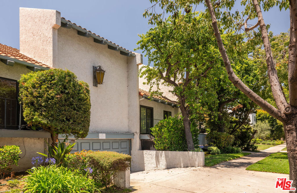 Welcome to this elegantly renovated townhouse, nestled in the heart of Santa Monica, North of Wilshire. This thoughtfully designed split-level home offers two spacious bedrooms, each with its own beautifully updated en-suite bathroom featuring stylish fixtures and sophisticated finishes. The inviting living room is bathed in natural light and boasts high ceilings and a cozy fireplace. The modern kitchen features brand new stainless steel appliances, generous countertop space, and ample cabinetry, ideal for both everyday living and hosting. Step outside to a private patio just off the living area, offering relaxation and cool breezes. Additional features include newly installed flooring, dual pane windows, recessed lighting, and a convenient in-unit washer/dryer. Located just blocks from vibrant Montana Avenue, you'll enjoy easy access to premier shopping, dining, and the Santa Monica lifestyle you've been dreaming of.