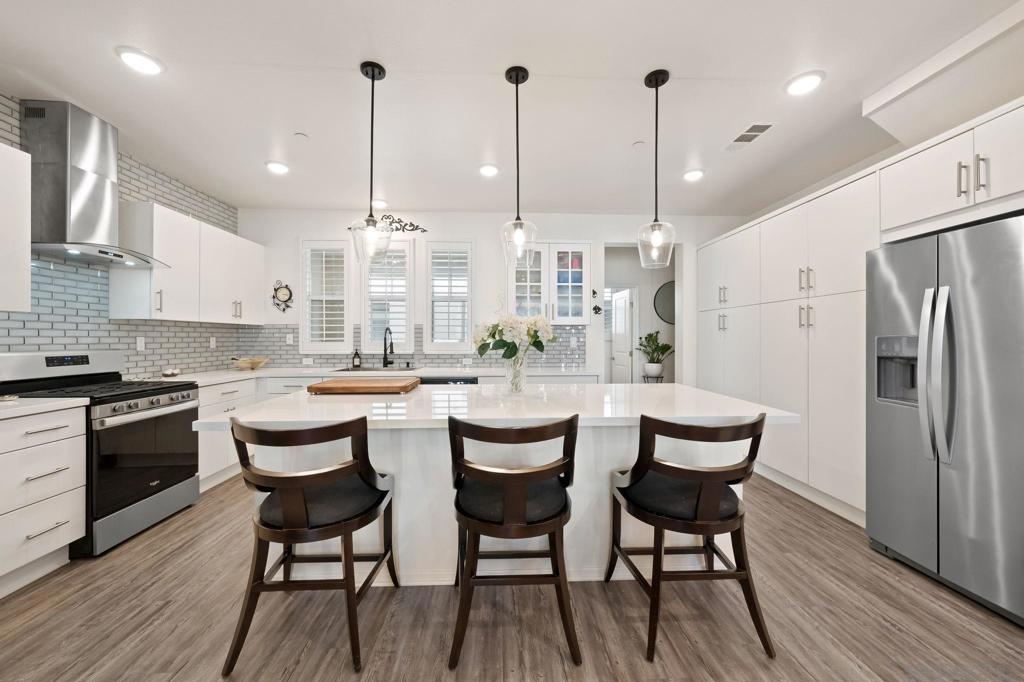 Modern, functional, this tri-level townhome in Playa Del Sol is a rare find. One of the few homes in the community that offers a long driveway with space for two extra cars in addition to the attached 2-car garage. Parking for four? That’s almost unheard of here. Inside, you’ll find 3 spacious bedrooms, 2.5 bathrooms, and an open main level that blends kitchen, dining, and living areas seamlessly. The oversized kitchen island is the heart of the home—perfect for cooking, working, or gathering with friends and family. And with an assumable FHA loan at a low 3% interest rate, this home offers a smart financial opportunity for qualified buyers. Located in the gated Playa Del Sol community, you’ll also enjoy access to resort-style amenities including a pool, gym, clubhouse, and more—all just minutes from shopping, schools, and freeway access.