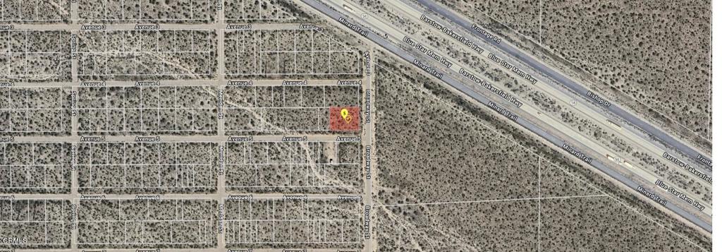Affordable opportunity to own a corner lot in the community of Mojave, California! This 12,000+ sq ft parcel (APN 247-082-32-00-0) offers excellent potential for future development or long-term investment. Located in a quiet desert neighborhood with easy access to Highway 14 and Highway 58, this lot is ideally situated for those seeking space, convenience, and value. Close proximity to Mojave Air & Space Port and major transportation routes. There is no address associated with this parcel. Buyer to perform due diligence.