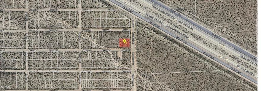 Affordable opportunity to own a corner lot in the community of Mojave, California! This 12,000+ sq ft parcel (APN 247-082-32-00-0) offers excellent potential for future development or long-term investment. Located in a quiet desert neighborhood with easy access to Highway 14 and Highway 58, this lot is ideally situated for those seeking space, convenience, and value. Close proximity to Mojave Air & Space Port and major transportation routes. There is no address associated with this parcel. Buyer to perform due diligence.
