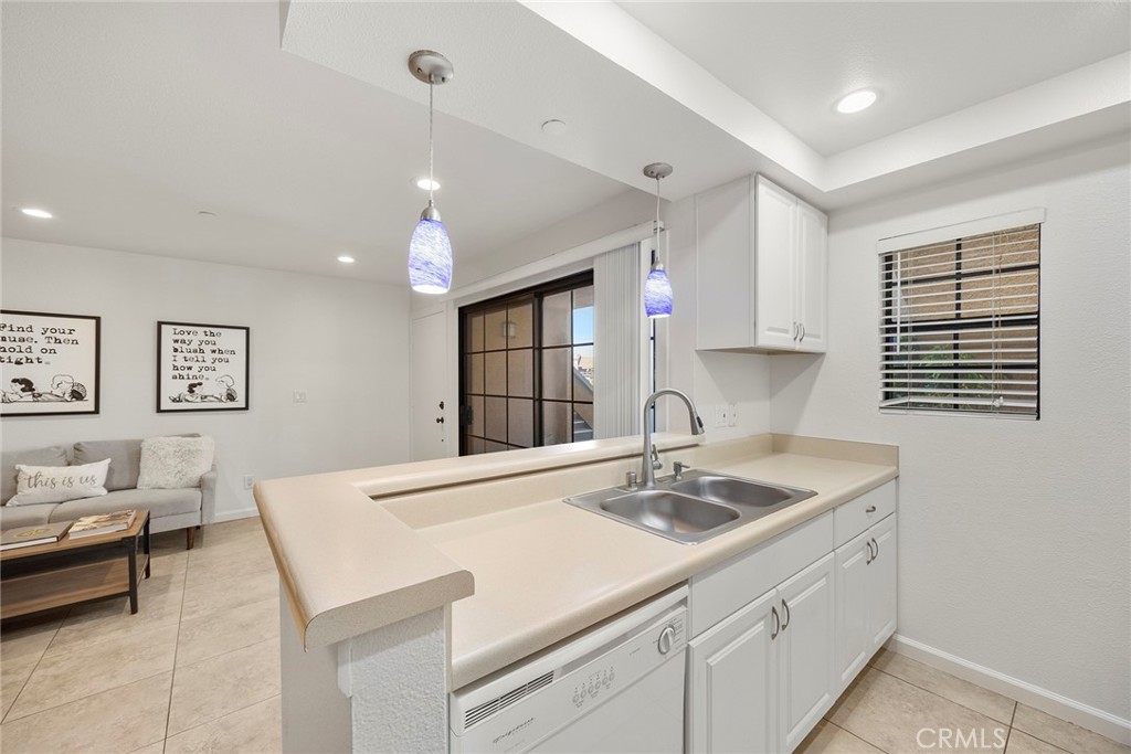 Price improvement on this Ocean-Close Ground-Level Condo in Vista Pacifica, San Clemente!
Live the coastal lifestyle in this beautifully upgraded ground-level condo just minutes from the beach! Located in the highly desirable Vista Pacifica community, this charming 1-bedroom, 1-bath home is move-in ready and full of thoughtful updates.
Step inside to find neutral ceramic tile flooring throughout, recessed lighting, and a freshly painted interior. The kitchen appliances, including a microwave, gas stove/oven, and dishwasher—perfect for home chefs. A ceiling fan over the dining area ensures year-round comfort. The bathroom features a tub/shower combo with updated vanity, lighting, fixtures, and a newer toilet. The spacious bedroom includes mirrored wardrobe doors and stylish artistic touches, offering both comfort and charm. Additional highlights include: In-unit washer and dryer, Detached 1-car garage with storage, Pool view from your unit. Conveniently located near Avenida Pico, with easy access to freeways, top-rated schools, shopping, and world-famous beaches. Whether you're looking for a weekend retreat, full-time home, or savvy investment—Shop fast!