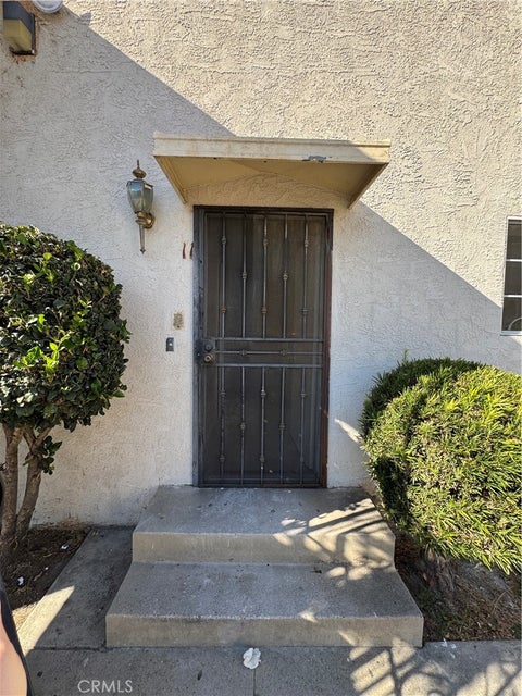 Photo of 921 Carob, Montebello, CA 90640 (MLS # DW26169269)