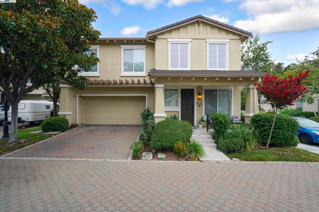 This beautifully upgraded corner-lot home sits in the heart of South Livermore, just moments from scenic vineyards, award-winning wineries, and local favorites. Step inside to a bright, open entry that flows into the living and formal dining rooms. The home features upgraded flooring throughout the downstairs, a modern kitchen with stainless steel appliances and Corian counters, and a spacious family room complete with a cozy gas fireplace. Upstairs, the primary suite showcases a stunningly remodeled bathroom with upgraded cabinetry, granite counters, new flooring, and a custom shower. The hall bath was also tastefully remodeled in 2024. Additional thoughtful upgrades include permanent holiday lighting, new ceiling fans in every room, new blinds on the second floor, and brand-new backyard fencing. The backyard is perfect for entertaining with a new aluminum patio cover that opens and closes, while the community park and guest parking are just steps away. Comfort features include central A/C and an included refrigerator. Walking distance to Bruno Canzoni Park, Altamont Brewery, and Wood Family Winery, and close to Lawrence Livermore Labs. Don’t miss the chance to own this highly upgraded South Livermore Valley gem!
