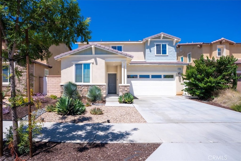 Located in Camden Place at Menifee Town Center, this spacious home offers walkable amenities and quick I-215 access. Community features include trails, dog parks, pool, playground, and outdoor gathering areas. Just 0.6 miles from Countryside Marketplace and Newport Plaza, you’ll enjoy easy access to dining and shopping. Inside, the open floor plan highlights espresso flooring, natural light, and a large living area connecting to a sleek kitchen with inviting countertops. The master suite includes a bath with shower, dual sinks, and walk-in closet, while an upstairs loft provides extra living space. A fully owned solar system—grandfathered under the original Socal Edison NEM plan delivers significant energy savings on monthly basis. The backyard offers pet-friendly turf, a gazebo with built-in projector screen, and electrical connections, ideal for entertaining or movie nights under the stars.
