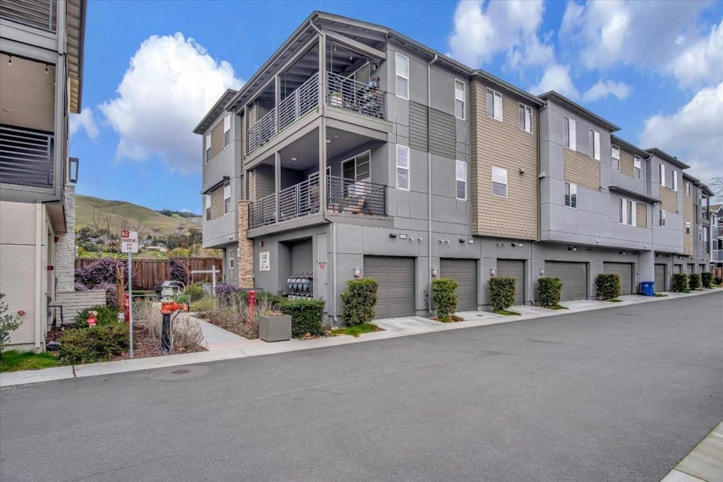 Welcome to Sohay community, it was built by famous builder Taylor morrison, this 2-bedroom, 2-bathroom, 2-level spacious condo elegance in the coveted Mission Garin Community of Hayward, this home features an open-concept floor plan flooded with natural light with huge balcony. The gourmet kitchen boasts ample cabinet space, granite countertops, stainless steel appliances, including a gas range, and a spacious island with a breakfast bar, upgraded kitchen hood, Luxurious amenities include walk-in closets, a master bath with dual sinks, beautiful flooring, tankless water heater, a private patio, and an attached one-car garage. Enjoy the convenience of PAID OFF solar panels with a 17-year reserve, LOW PG&E COST (Avg $20/month). Located near BART, I-880, Hwy 238, and Hwy 92, with the added benefit of a $400 Annual Clipper Card for Bart credit provided by the HOA for residents. Experience the perfect blend of comfort and functionality in this desirable location.