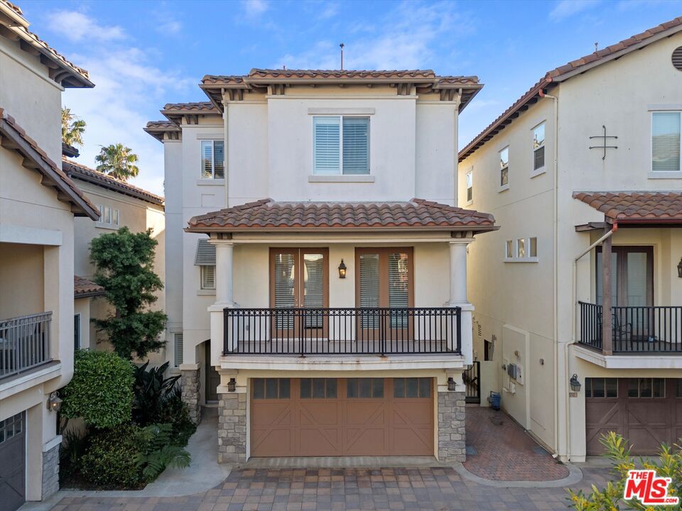 Step into this beautifully renovated 3-bedroom, 3.5-bath free-standing home, perfectly situated in one of Silicon Beach's most sought-after communities. Thoughtfully designed with high-end finishes and an airy, open layout, this home offers the ideal blend of comfort, sophistication, and California lifestyle. Upon entry, you'll be greeted by soaring ceilings, white oak flooring, elegant crown molding, and striking Venetian plaster walls that carry throughout the home. The main living area exudes warmth and style with a cozy fireplace and private balcony that seamlessly connects indoor and outdoor living. At the heart of the home, the chef's kitchen impresses with a center island, stainless steel appliances, granite countertops, and newly refinished cabinetry, perfect for both everyday meals and effortless entertaining. The spacious primary suite provides a peaceful retreat, complete with a generous walk-in closet, dual vanities, a luxurious jetted tub, a separate shower, and marble flooring. Designer window treatments include Restoration Hardware linens and Shade Store hardware, enhancing both comfort and aesthetic. Additional highlights include an attached 2-car garage and one of Playa Vista's largest private yards, perfect for outdoor dining, pets, or play. Nestled between a serene private courtyard and a charming tree-lined corridor, this home offers a rare sense of privacy and tranquility, making it ideal for quiet, comfortable living. As a resident of Playa Vista, you'll enjoy access to world-class amenities including a community center, business hub, state-of-the-art fitness center, resort-style pool and spa, private movie theater, tennis courts, and three dog parks just steps from your door. You're also moments from The Resort, Whole Foods, the weekly Farmers Market, Concert Park, top dining, boutique shopping, and more. Truly move-in ready and full of character, this Playa Vista gem offers elevated coastal living at its finest.