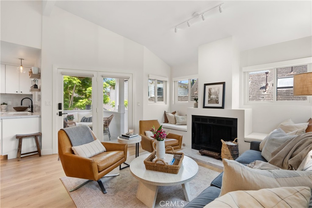 Located on one of the most sought-after tree-lined streets in Corona del Mar, this charming, fully remodeled two-bedroom, two-bath treehouse home with a spacious loft offers the perfect blend of coastal charm and modern living. Just a short stroll from the shops, cafés, Begonia Park, and the beach, and minutes from Balboa Island and Fashion Island, the home enjoys a premier location in one of the area’s most walkable and welcoming neighborhoods. The residence features a bright and inviting living room with a fireplace, an updated kitchen, and a dedicated dining area. Both bedrooms are generously sized with king beds, including a primary suite with an en-suite bathroom. The airy loft provides versatile space ideal for a home office, media room, or guest accommodations. A private brick-lined entry welcomes you with a fountain and lush landscaping, leading to a shaded patio that captures refreshing ocean breezes. Additional amenities include a private carport, in-unit washer and dryer, and on-site EV charging. The home is available for a 12-month lease and can be rented furnished or unfurnished to suit your needs.