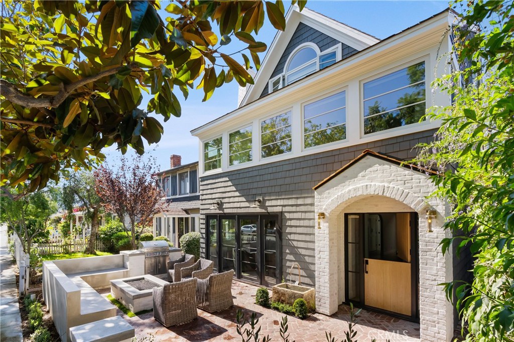 Located on one of the most sought-after tree-lined streets in Corona del Mar, this charming, fully remodeled two-bedroom, two-bath treehouse home with a spacious loft offers the perfect blend of coastal charm and modern living. Just a short stroll from the shops, cafés, Begonia Park, and the beach, and minutes from Balboa Island and Fashion Island, the home enjoys a premier location in one of the area’s most walkable and welcoming neighborhoods. The residence features a bright and inviting living room with a fireplace, an updated kitchen, and a dedicated dining area. Both bedrooms are generously sized with king beds, including a primary suite with an en-suite bathroom. The airy loft provides versatile space ideal for a home office, media room, or guest accommodations. A private brick-lined entry welcomes you with a fountain and lush landscaping, leading to a shaded patio that captures refreshing ocean breezes. Additional amenities include a private carport, in-unit washer and dryer, and on-site EV charging. The home is available for a 12-month lease and can be rented furnished or unfurnished to suit your needs.
