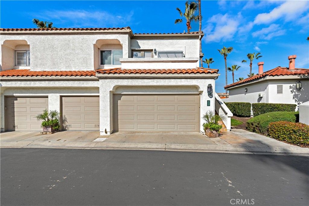 Photo of 49 Tennis Villas Drive, Dana Point, CA 92629 (MLS # OC26085232)