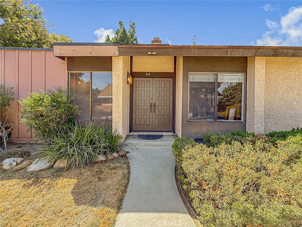 Welcome to this charming single-story 2-bedroom, 2-bathroom condo that combines comfort and convenience in a desirable community setting. Step into the spacious living room, where soaring ceilings and a cozy fireplace create a warm and inviting atmosphere. The primary bedroom also boasts high ceilings, generous closet space, and a private bath, offering a true retreat. The secondary bedroom is nicely sized, perfect for family, guests, or a home office.
Enjoy outdoor living in the cute courtyard with endless possibilities—ideal for gardening, relaxing, or entertaining. Additional highlights include a large two-car garage for plenty of storage and parking.
The community itself offers wonderful amenities including a sparkling pool and tennis court, providing both recreation and relaxation just steps from your door.
This condo is a perfect blend of charm, functionality, and lifestyle—ready for you to make it your own!