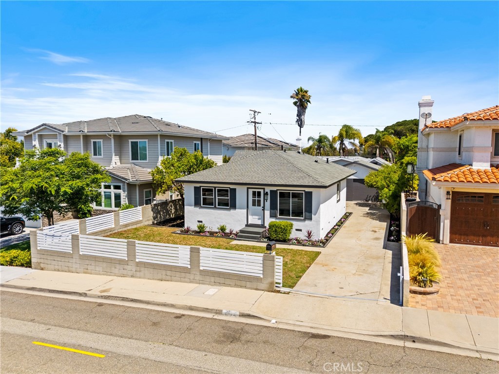 Break into Redondo Beach! Situated on a spacious 5,166sqft lot in one of most sought-after neighborhoods of North Redondo is this charming, single-story home. Featuring 4 bedrooms and 2 bathrooms, a remodeled kitchen with tile counters and soft-close cabinets, and open living areas filled with natural light. Step outside to enjoy a private yard ideal for entertaining or relaxing. Watch a movie in your theater bonus room off the garage. Minutes from Hermosa Beach and Manhattan Beach, award-winning Redondo schools including Lincoln Elementary and Redondo Union High School, Trader Joe’s, Target, Anderson Park, and the booming corridor down Artesia Blvd, filled with gourmet restaurants and boutique shops—this is the lifestyle you’ve been waiting for.