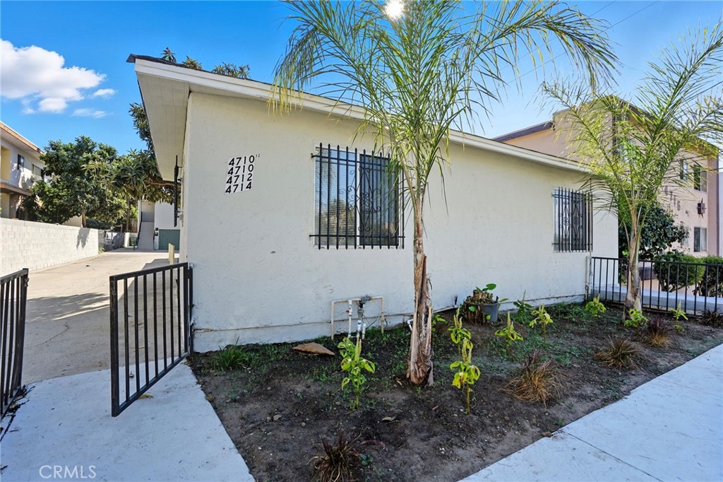 Ideal for first-time homebuyers or investors alike, this meticulously-maintained 4-unit property offers flexibility and strong income potential. Two units will be delivered vacant—including a spacious 3-bedroom, 2-bath attached front house with a private patio garden, perfect for owner-occupancy. The front duplex (built in 1949) features two 3-bedroom units, while the rear duplex (built in 1987) includes two 2-bedroom, 1-bath units. Recent upgrades include a brand-new roof (2025) and brand new tankless water heaters for all units. The large 8,523-SF lot offers two detached garages, ample on-site parking, and potential for additional parking or an ADU. Conveniently located across from Alta Loma Elementary and close to shops, restaurants, parks, transit, and major freeways—this is a rare opportunity to live in one and let the others pay your mortgage.