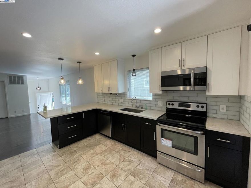 Spacious 2 bedrooms /1.5 bathrooms open floor plan home in a duplex with private garage and abundant outdoor space. This beautiful home has every amenity and the location is a commuter’s dream. 1 block from the freeway, a 10-minute walk to the 12th Street Downtown Oakland Bart Station, and a 15-minute walk to the West Oakland Bart Station. You can be in downtown San Francisco in under 25 minutes! It is the DOWNSTAIRS unit of a 2-unit duplex in a lovely neighborhood just a few blocks from all the restaurants, bars, and entertainment downtown Oakland has to offer. Highlights: - Beautiful, open concept kitchen with new energy-star, premium appliances  and tons of counterspace - new washer and dryer in unit - Large private deck, great for gardening and BBQing - Beautiful, spacious, and pet-friendly backyard, with string lights and recent landscaping, perfect for hosting parties or dinner al fresca (shared with upper unit) - Private attached 1-car garage with smartphone access and EV Charger + driveway with additional private parking space, 2 total - Ring security system - Amazon-enabled garage. Will consider pets with additional pet deposit TERMS: $3,100/Month, One-year Lease, Security Deposit: 1 month rent. Tenant Responsibilities: PGE & Water. Landlord pays for Garbage. NO Smoking.