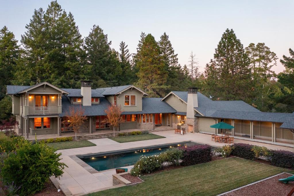 Situated on 60 private acres of picturesque, usable land, this exceptional gated estate spans three parcels with four separate entrances, offering a unique combination of luxury, sustainability, and boundless potential. The 4,700 SqFt modern Craftsman-style home includes 5 bedrooms and 3.5 baths, an open-concept living area, a gourmet kitchen, soaring ceilings, and much more. Perfect for entertaining, the expansive outdoor spaces consist of a pristine pool, 423 SqFt cabana/ADU, outdoor kitchen, stone fireplace, hot tub, and a lush lawn. The award-winning 20-acre Pinot Noir vineyard with 4 distinct clones provides the option to continue farming, lease the land, or build your own winery. Equestrian amenities include a 6-stall barn with a wash area, tack room and bathroom, 4 paddocks, a pasture, and a 25,000 SqFt sport arena with all-weather footing. A private astronomical observatory allows for stargazing and imaging opportunities. The whole-home automatic commercial generator, solar panels with battery storage, and 2 wells with a 65k-gallon water storage system allow for a self-sufficient lifestyle. Located near Santa Cruz's world-class beaches, hiking and mountain biking trails, shopping, and dining, this estate provides a wonderful balance of privacy and convenience.