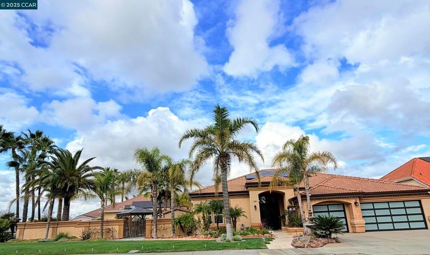 Your dreamed home is on your way. Single story set on a premium lot of 13,000sf. Entering you are greeted by an open floor concept with luxurious amenities, volume ceilings, huge windows that enhance the outdoor vistas. The living room boasts a custom fireplace, adequate space for a pool table and enjoy the adjacent media room with built-ins for entertainment equipment/display shelving. Step into the chef's kitchen featuring extensive chiseled granite counters, tiled custom backsplash, large breakfast bar with bar stools , huge walk-in pantry, SS appliances, wine frig & drinking water filter. Primary suite, a peaceful sanctuary with custom fireplace, luxurious bath featuring two separate vanities, chiseled granite counters, jacuzzi/spa tub, huge shower with travertine accents and mammoth closet space with organizers. Amazing outdoor amenities--a private garden off great room adds a covered porch, brand new gazebo for exterior dining/entertaining, splashing fountain, flower beds. Extensive deck across back of home gives boundless water views, access to 1 covered boat dock with hydro-hoist lift and room for 2nd boat. No HOA . New Solar system with Tesla Backup Gateway, New Garage doors and garage flooring.  All toilets are updated with Toto Washlet. Boat/Trailer sep price @$20k