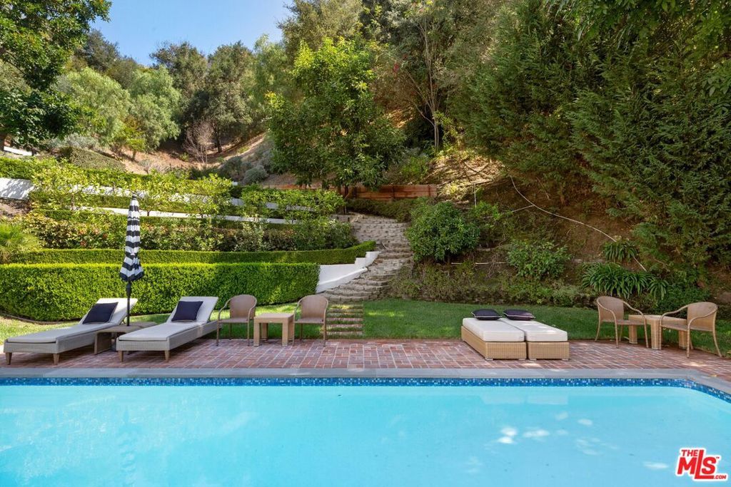 Photo of 880 Stone Canyon Road, Los Angeles, CA 90077 (MLS # 25601325)
