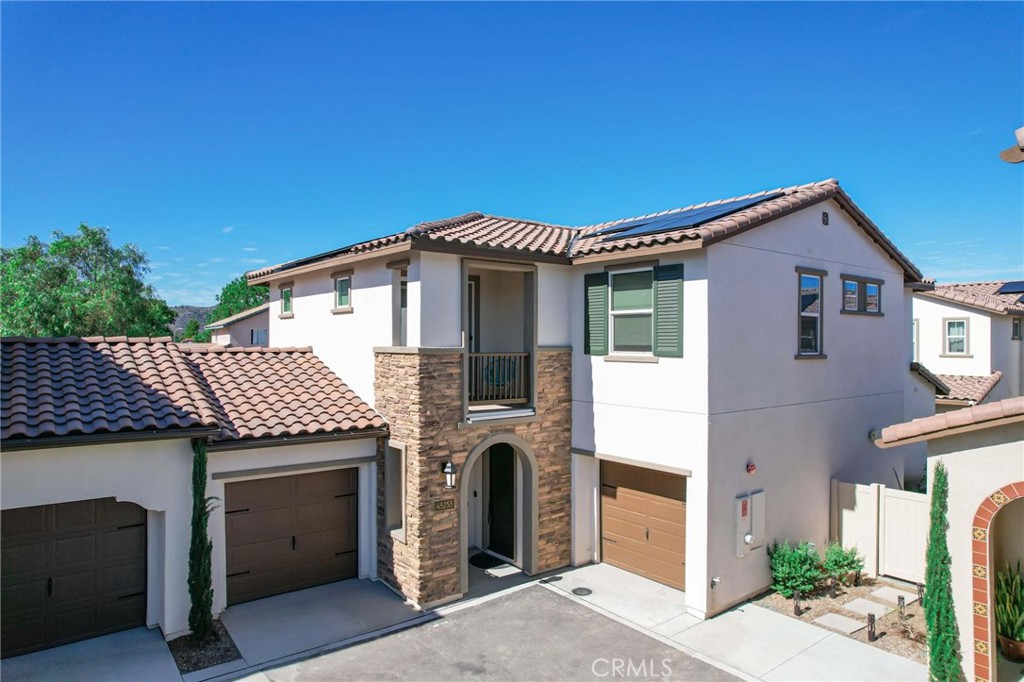 Beautiful modern smart home built in 2021, located in the gated community of Rancho Soleo in South Temecula. This spacious residence offers 2,424 sq. ft. of living space with two living areas, three bedrooms, and two and a half bathrooms, including a highly desirable Main-Floor Primary Suite. The open-concept design features vaulted and cathedral ceilings, recessed lighting, and neutral vinyl plank flooring throughout. The gourmet kitchen includes granite countertops, stainless steel appliances, a large center island with sink and bar seating, modern fixtures, built-in microwave, refrigerator, and pantry, all flowing seamlessly into the dining area and expansive living room filled with natural light.
The primary suite provides direct access to the backyard and boasts a spa-like bathroom with dual sinks, walk-in shower, and a generous walk-in closet. Upstairs, a spacious loft/family room with balcony access is complemented by two additional bedrooms with walk-in closets, a dual-sink hallway bathroom, and a separate laundry room with washer and dryer included. Smart home features include WiFi-enabled thermostats, and Ring doorbell. Attached 2-single car garage. Energy efficiency is enhanced by solar panels, Central A/C, and the low-maintenance backyard adds convenience.
Rancho Soleo offers resort-style amenities such as a pool, spa, clubhouse with fireplaces, dog park, and neighborhood parks. Ideally situated near award-winning schools including Great Oak High School, this home also provides easy access to the I-15 freeway, Pechanga Resort, Old Town Temecula, and Wine Country. Available in September, with HOA dues covered by the owner. Make this your dream home and call today to schedule your private tour!