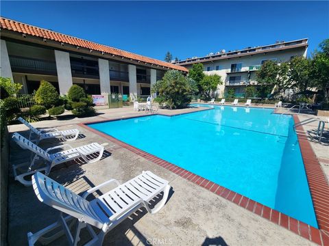 Photo of 5460 White Oak Avenue #H106, Encino, CA 91316 (MLS # SR25230042)