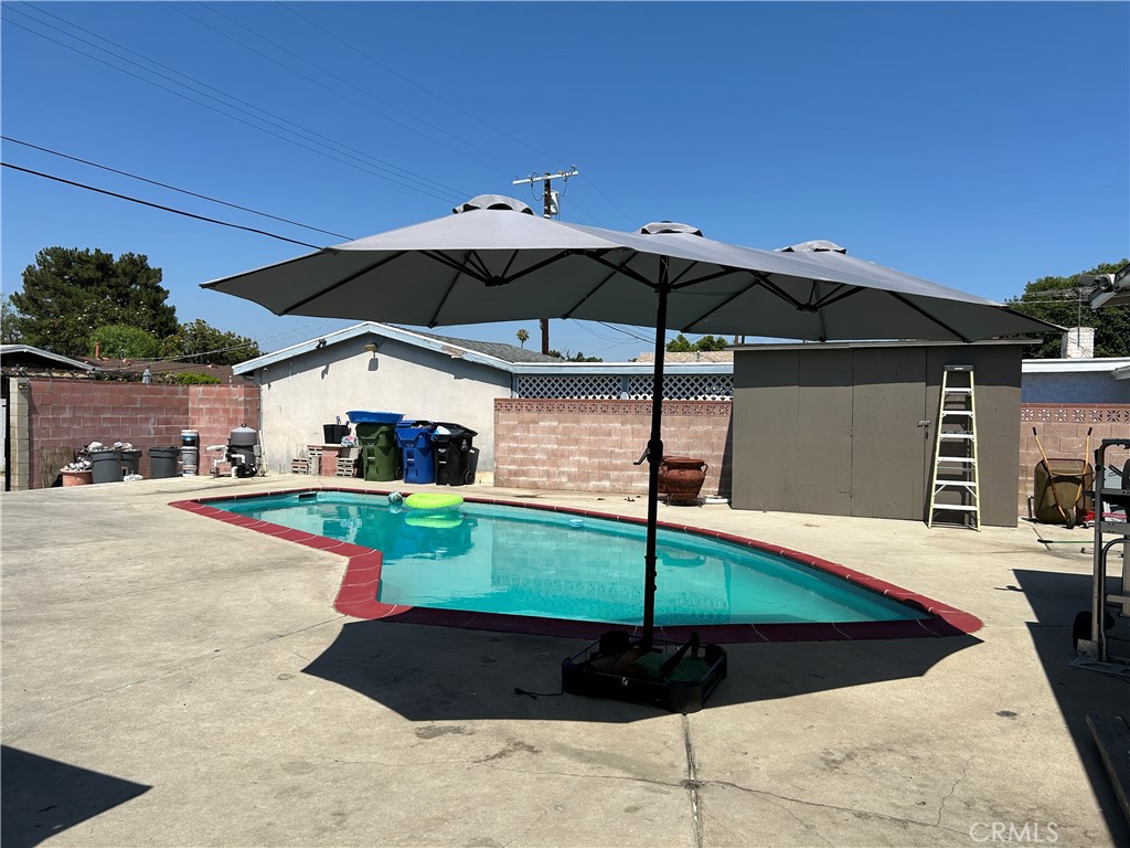 Beautiful pool home in the city of Winnetka. Get ready to enjoy your summers barbecuing and swimming in your own pool. In addition, your family will enjoy the comfort of all the spaces in this home. Home features 3 bedrooms and 2 bathrooms with good size living and dining rooms right next to the kitchen. The front yard is gated for additional privacy and it creates a perfect space for gardening.
The 2 car garage is detached and a back gate allows for additional parking in the back yard. If you are thinking about adding an ADU to your new property, this property has the ideal set up (Buyers to conduct their own investigation with the city about ADU permit).
This home qualifies for a $35,000.00 down payment assistance program for downpayment and closing cost.
Do not hesitate to contact us for a private showing of this unique property.