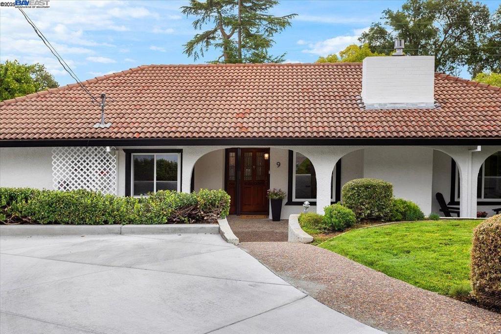 Classic 3 bedroom Mediterranean home at the end of a desirable cul-de-sac! Move-in condition! Remodeled kitchen and baths. Lovely yard to entertain in with inviting pool with safety fence. Many recent improvements including recently installed vinyl windows, tankless water heater, new back retaining wall, fence/gate, fresh concrete slabs in driveway, walkway, back yard, and side of home. Back sprinklers helpful to keep the fresh landscaping including the newly laid sod vibrant and green! Wonderful fruit trees including Orange, lemon, and lime. Front retaining wall newly strengthened with anchors. Trench drain added behind pool bath in addition to a new roof placed over this structure. 2 car detached garage with driveway. Need more parking? Thanks to a recorded easement driveway to the left side of home, there is plenty of room to house an RV or boat in the rear without compromising the delightful yard! Large, relatively flat lot. Electrical outage? No problem with emergency generator equipped to keep the lights and all electrical power on! Wonderful Lafayette schools. Easy access to freeway without hearing it! Ideal location convenient to go to both downtown Lafayette and Walnut Creek stores and restaurants. This home offers a great all around package to a lucky buyer!